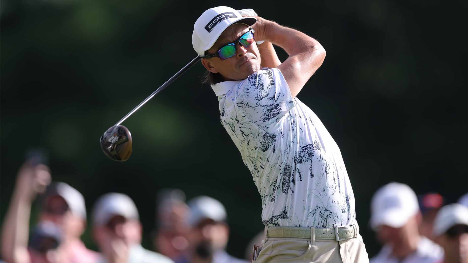 Rickie Fowler hits a shot during the Travelers Championship